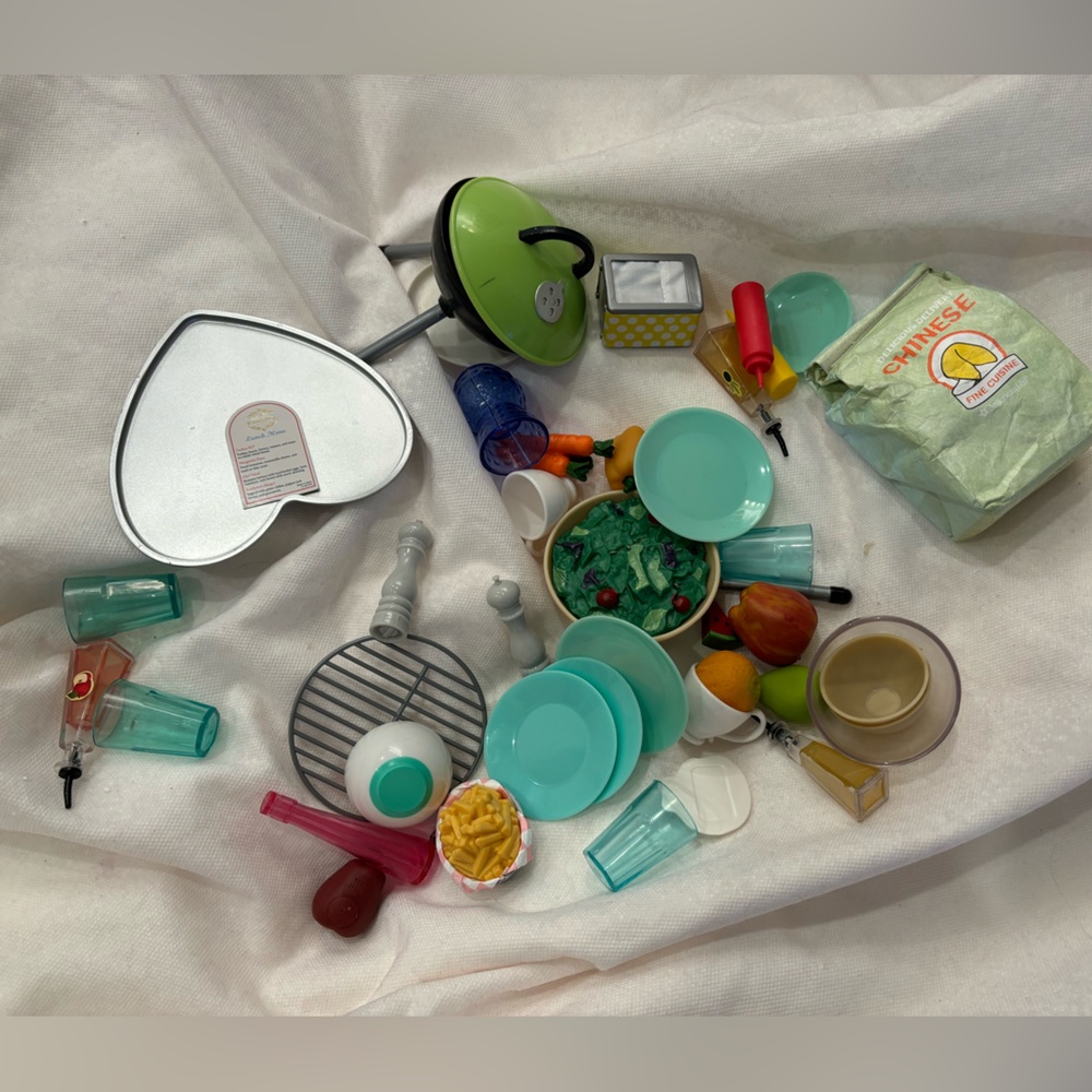 Assorted American Girl Doll food, cookware and dishes